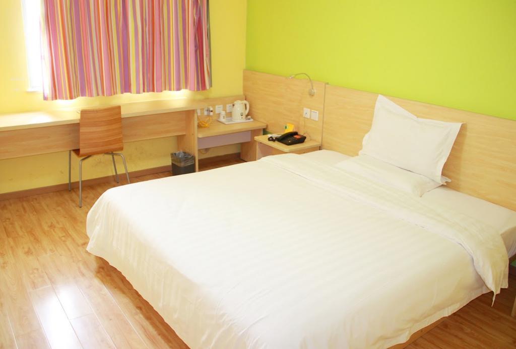 7Days Inn Qingdao Haiyunan Xinglong Road Номер фото