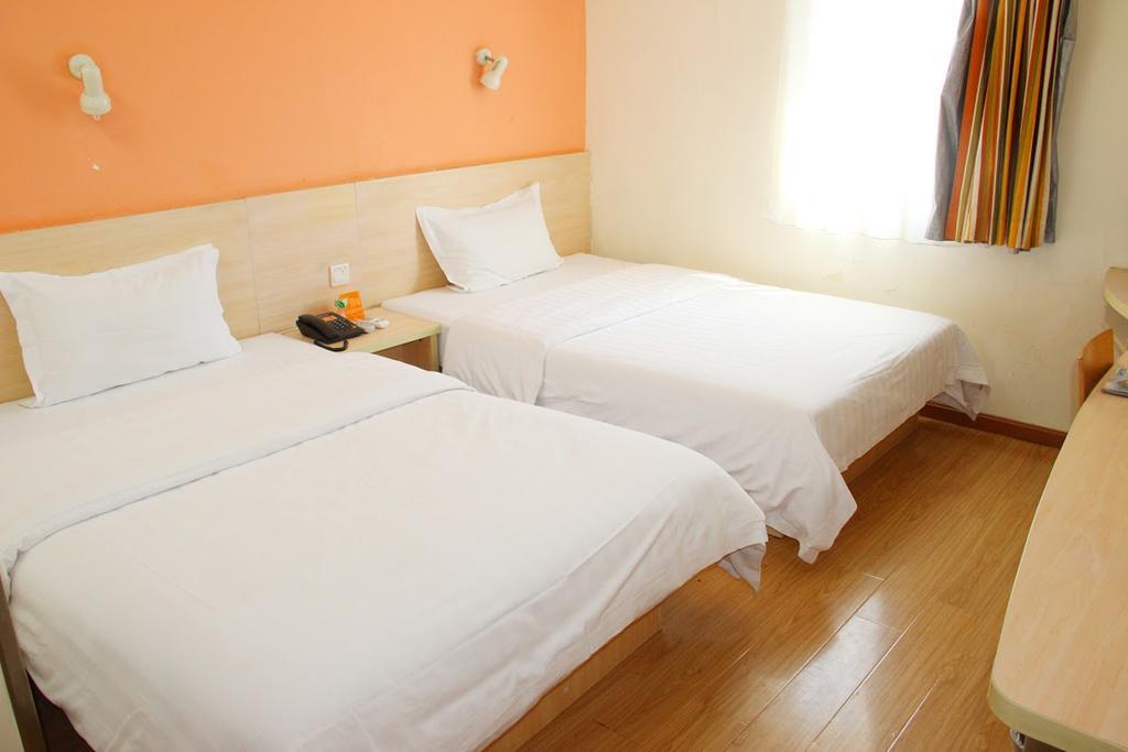 7Days Inn Qingdao Haiyunan Xinglong Road Номер фото