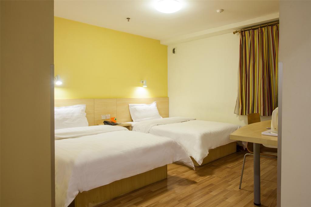 7Days Inn Qingdao Haiyunan Xinglong Road Номер фото