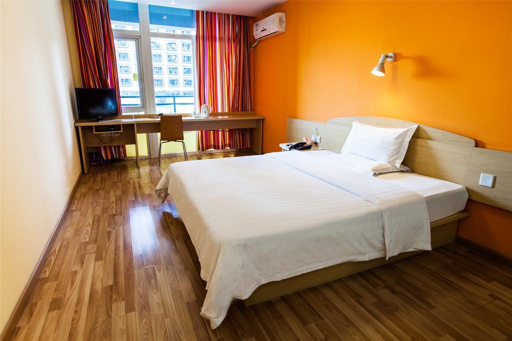 7Days Inn Qingdao Haiyunan Xinglong Road Номер фото